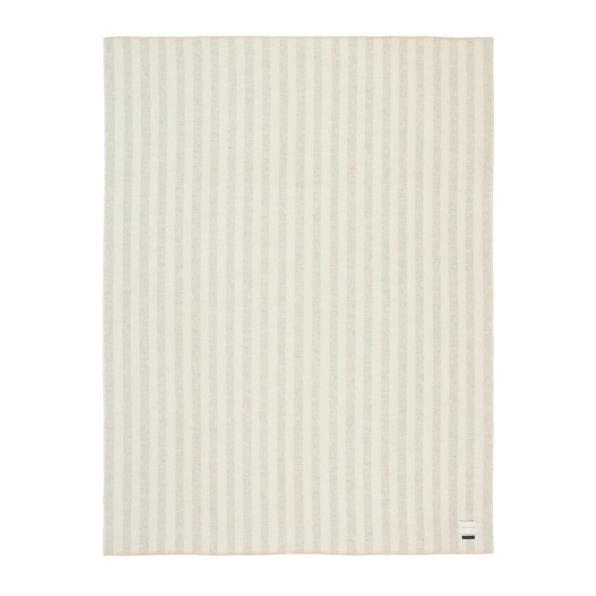 Beige Alpaca blanket with a subtle beige and ivory stripe pattern on a white background