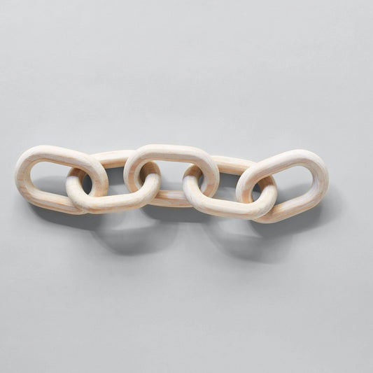 Decorative wooden chain on a gray background