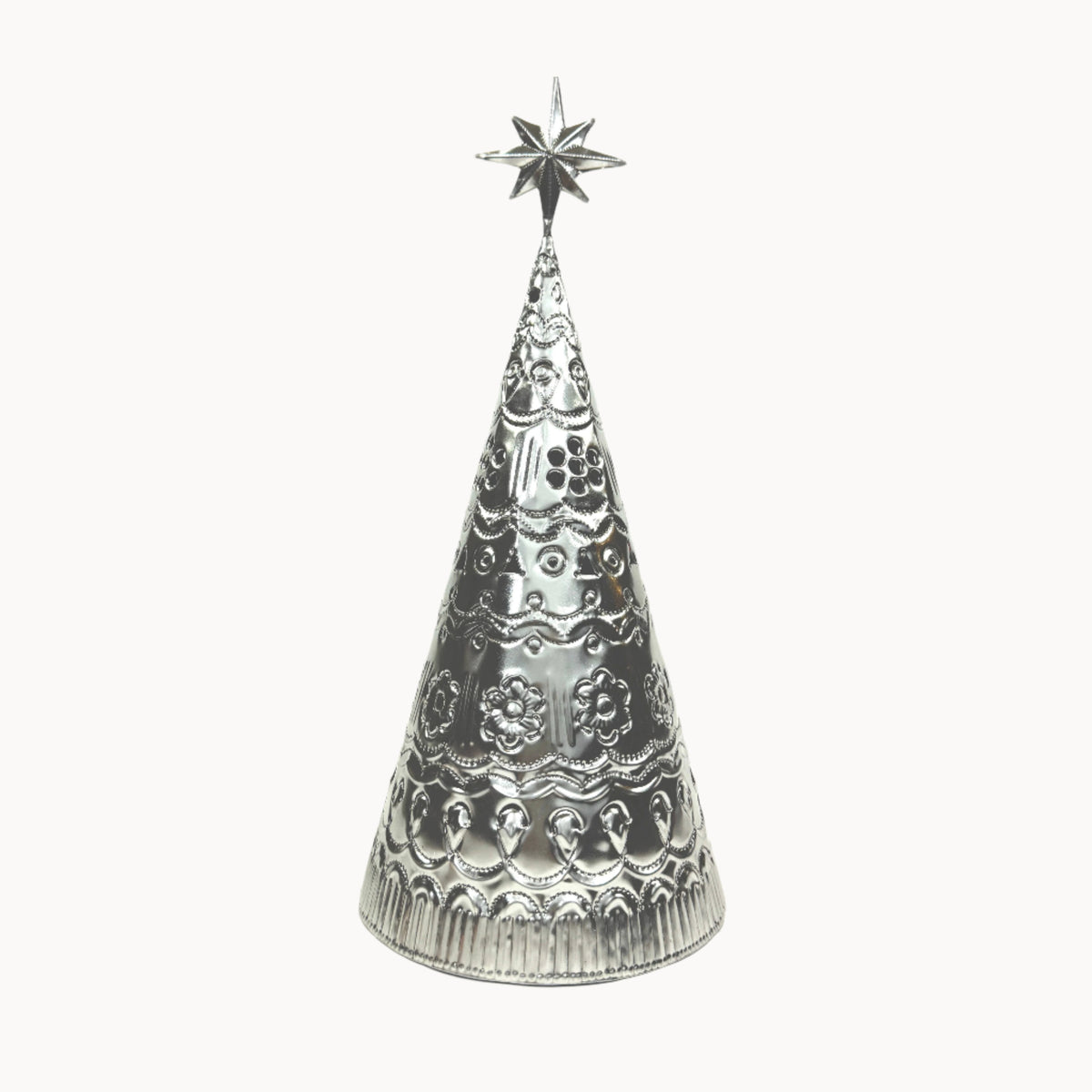 Decorative silver Christmas tree with star on a white background