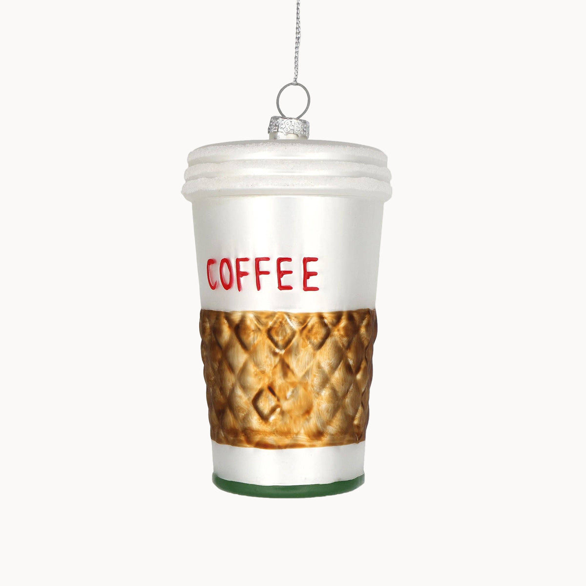 Decorative ornament shaped like a coffee cup with 'COFFEE' text on a white background