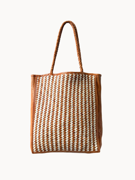 Woven leahter tote bag with brown and white pattern on a white background