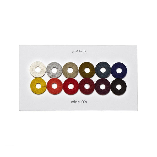 Set of colorful wine charms on a white card with 'graf lantz' branding.