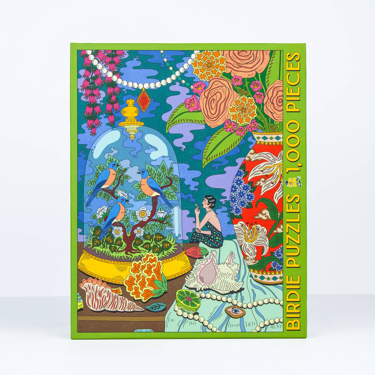 Colorful puzzle box with a design of birds, flowers, and a woman sitting, featuring the brand 'Birdie Puzzles'.