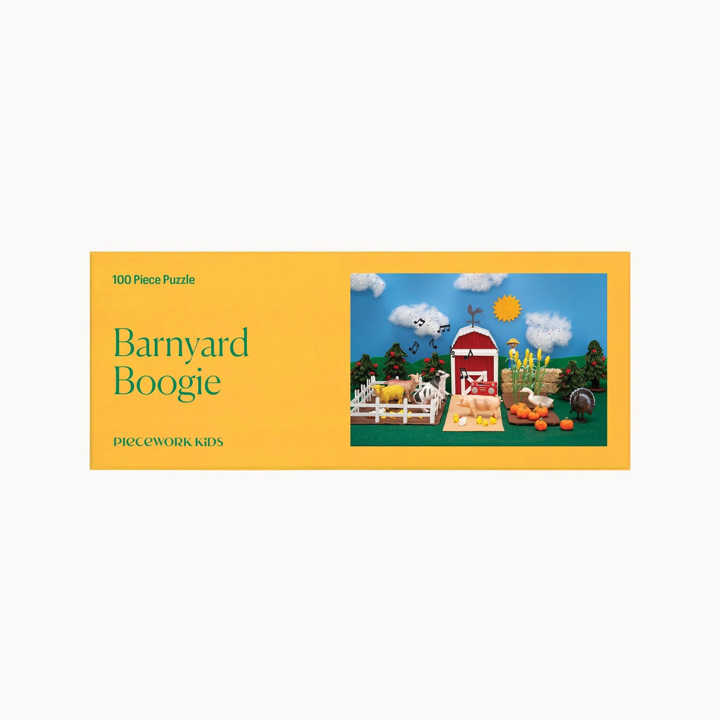Puzzle box with 'Barnyard Boogie' design featuring a barn and farm animals on a yellow background.
