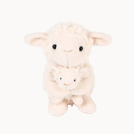 Plush toy lamb on a white background