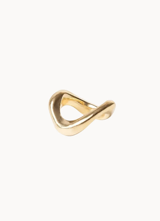 Gold ring with a unique design on a white background
