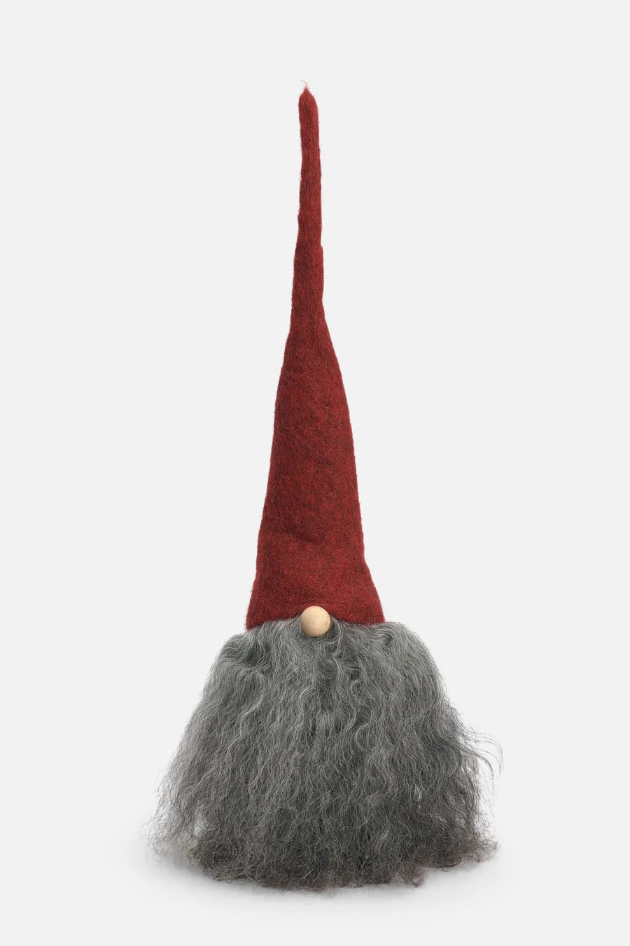 Felted gnome with a red hat and gray beard on a white background