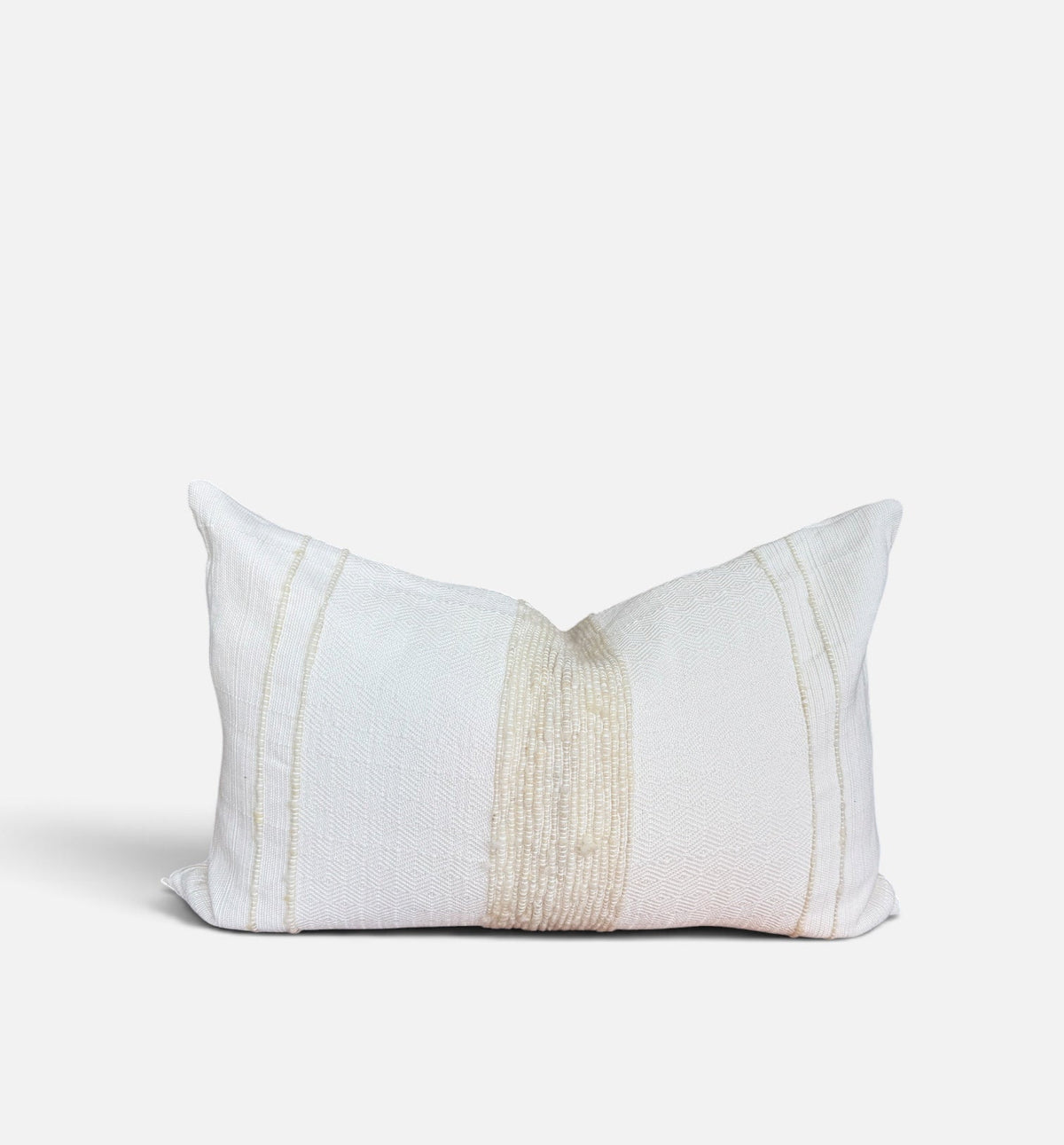 A rectangular ivory throw pillow with a central vertical beige textured stripe and two thin vertical beige stripes on either side, shown on a light gray background.