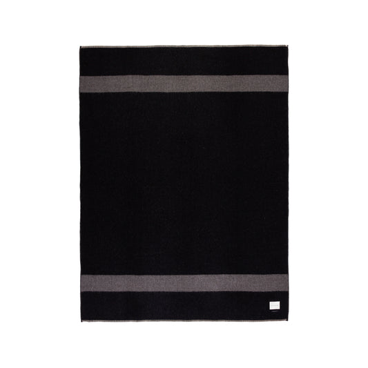 Black and gray striped Alpaca wool blanket on a white background