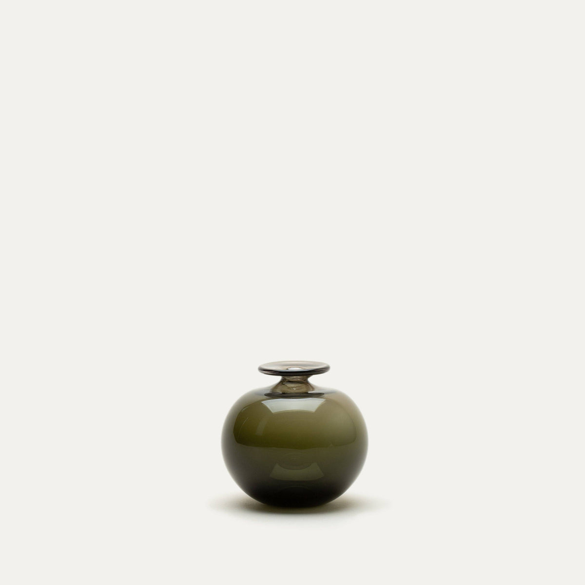 Dark green ceramic vase on a white background