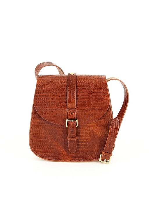 Brown textured handbag with a brass buckle on a white background