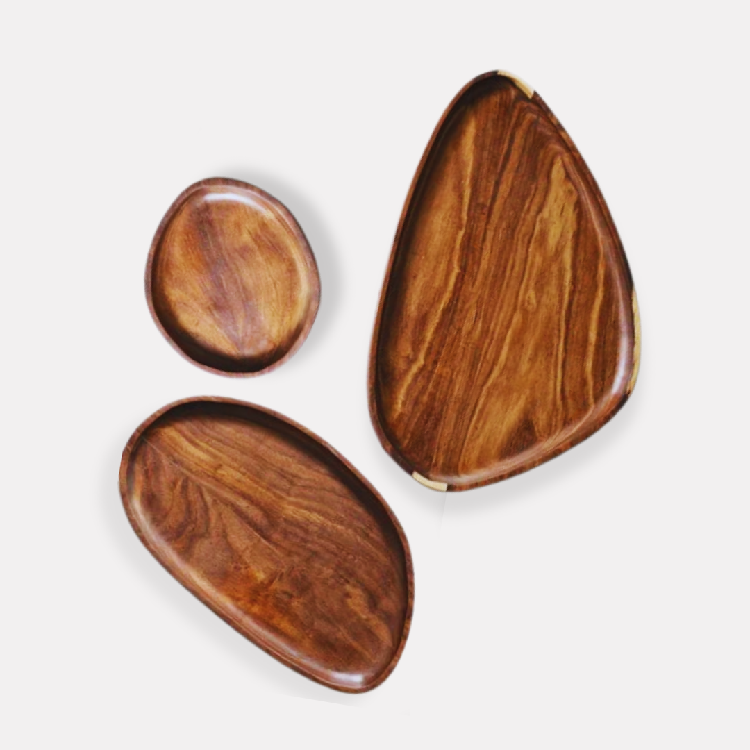 Three different sized wooden trays with a polished finish, displayed on a white background.