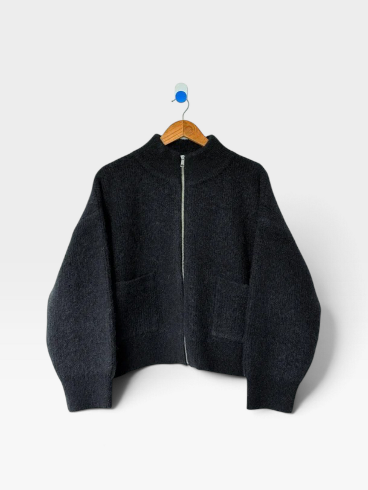 Black wool zip jacket with square front pockets