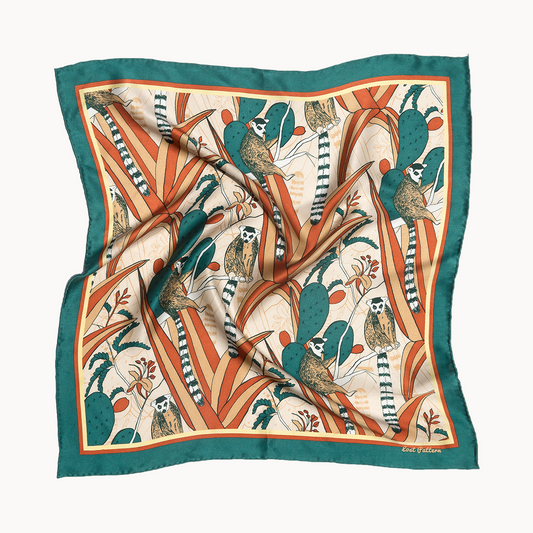 Decorative scarf with lemur and plant pattern on a white background