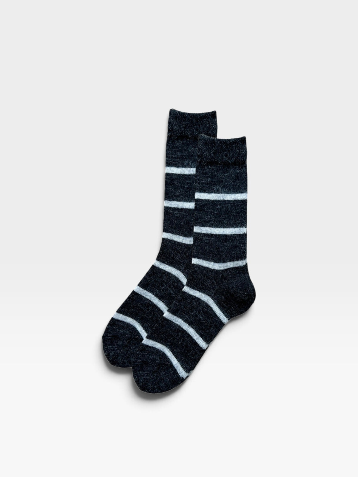 Pair of men's charcoal merino wool socks with a white stripe design set on a white background