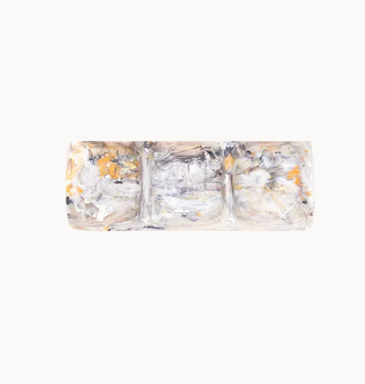 Three-part tray with a marbled, earth tone pattern on a white background