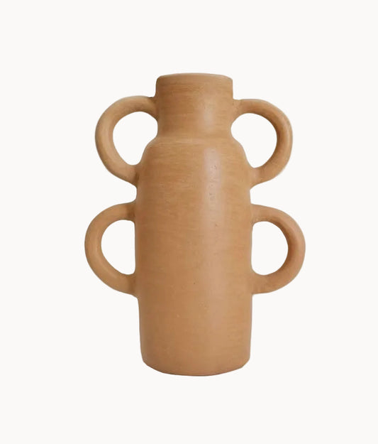 Tan ceramic vase with handles on a white background