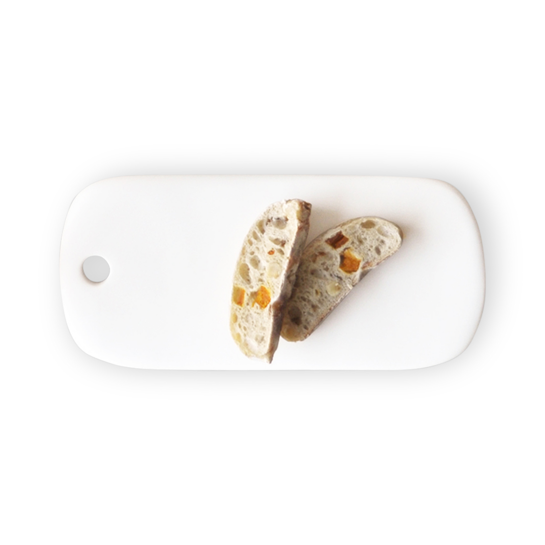 A small white bread board with a round hole at one end, featuring two slices of bread with toppings on top.