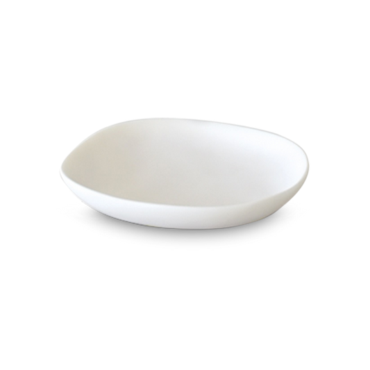 A smooth white, round sclupted plate with a smooth surface.