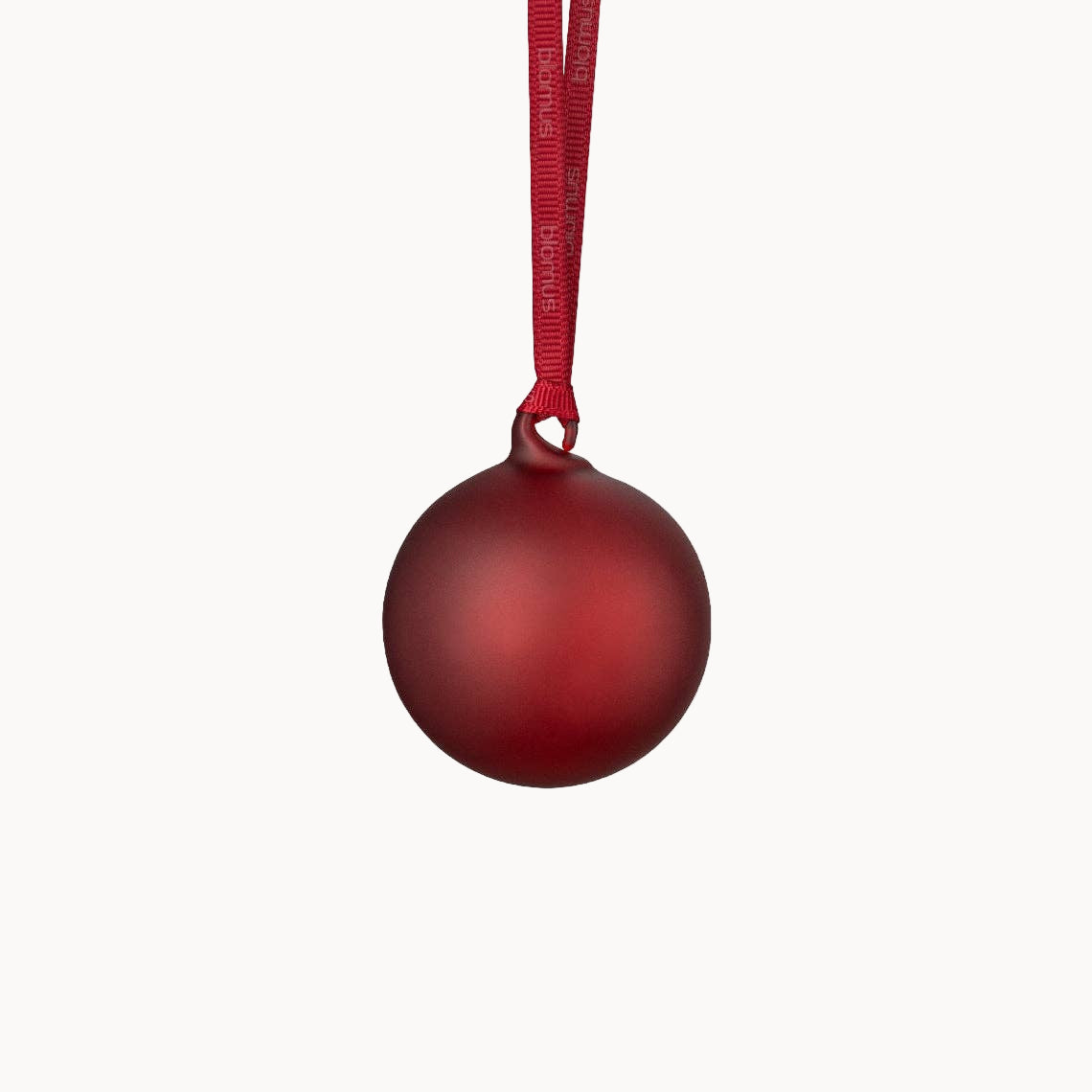 Burgundy Christmas ball ornament on a white background