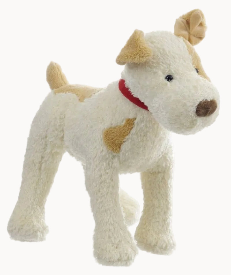 Plush toy dog with a red collar on a white background