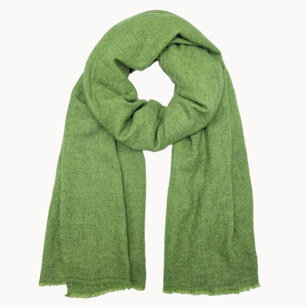 Green cashmere scarf on a white background