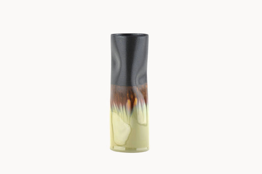 A tall, organic shape vase with gradient black, brown, and pale green design on a white background