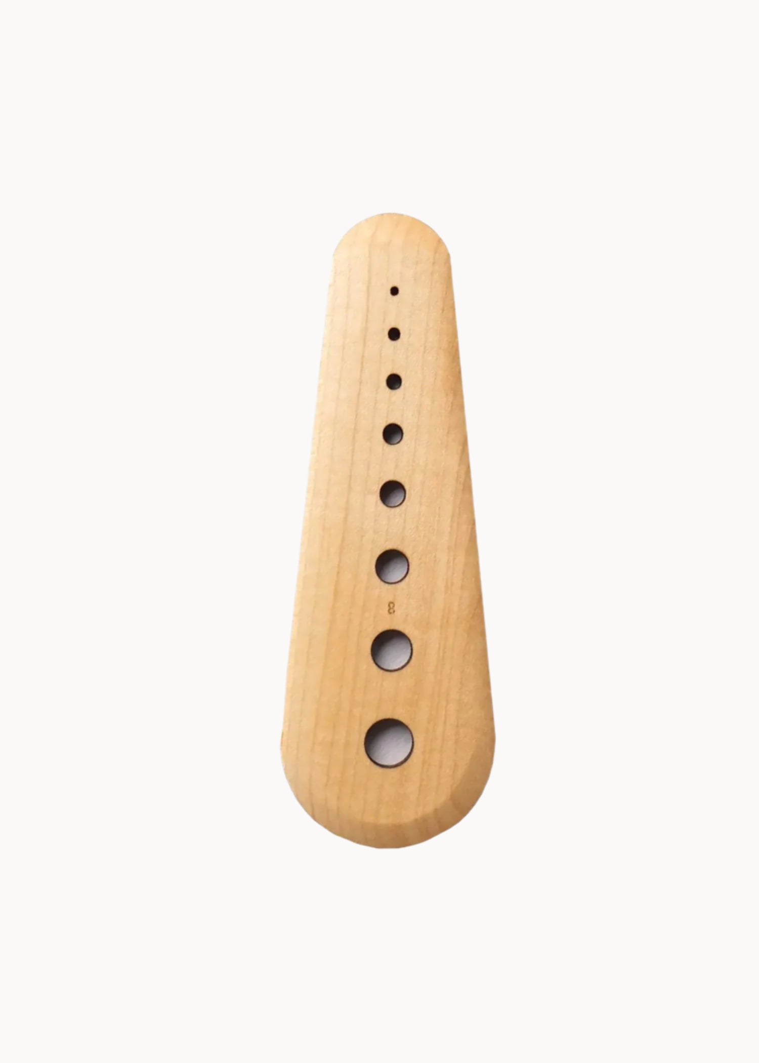 Maple wood herb stripper tool on a light gray background