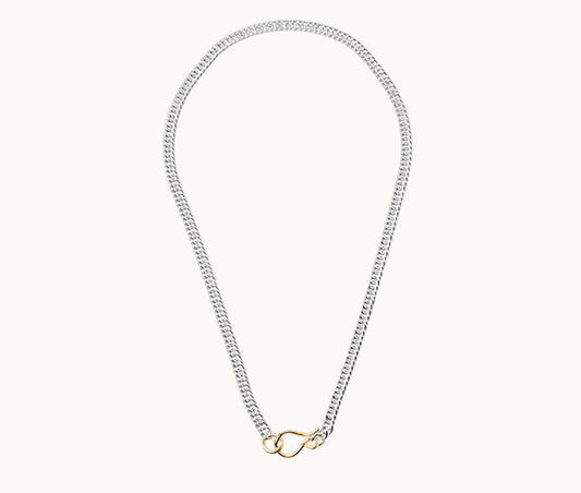 Silver chain necklace with a gold clasp on a white background